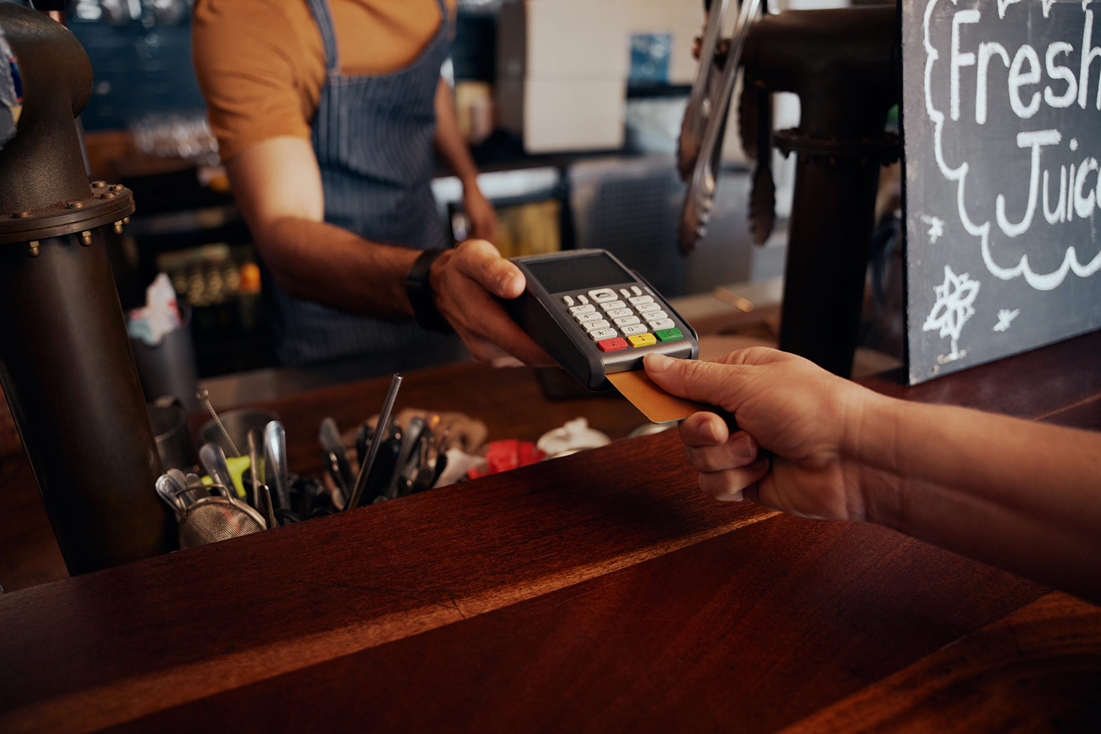 Paying with credit card at cafe